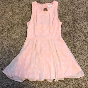 Blush and white polka dot open back dress!